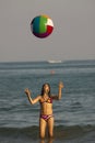 Girl play with Ball in the Beach Royalty Free Stock Photo