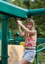 Girl on Playground Equipment Royalty Free Stock Photo