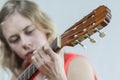 Girl playing acoustic guitar Royalty Free Stock Photo