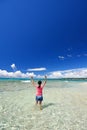 Girl playing on the beach