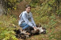 Girl playing with a Bernese Mountain Dog Royalty Free Stock Photo