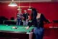 Girl playing billiard Royalty Free Stock Photo