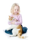 Girl playing with cat. Royalty Free Stock Photo