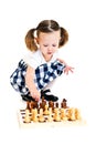 Girl playing chess Royalty Free Stock Photo