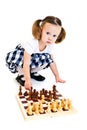 Girl playing chess Royalty Free Stock Photo