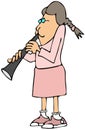 Girl playing a clarinet Royalty Free Stock Photo