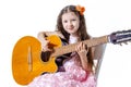 Girl playing classical guitar isolated on a white background Royalty Free Stock Photo