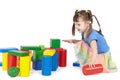 Girl playing with color toys Royalty Free Stock Photo