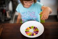 Girl playing with colorful candy Royalty Free Stock Photo