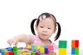 Girl playing colorful wood blocks Royalty Free Stock Photo