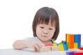 Girl playing colorful wood blocks Royalty Free Stock Photo