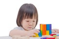 Girl playing colorful wood blocks Royalty Free Stock Photo