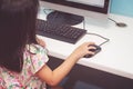 Girl playing with a computer Royalty Free Stock Photo