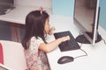 Girl playing with a computer Royalty Free Stock Photo