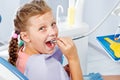 Girl playing with dental drill Royalty Free Stock Photo