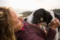 Girl playing with a dog while traveling Royalty Free Stock Photo