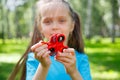 Girl playing with a fidget spinner Royalty Free Stock Photo