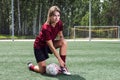 Girl playing football Royalty Free Stock Photo