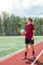 Girl playing football Royalty Free Stock Photo