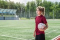 Girl playing football Royalty Free Stock Photo