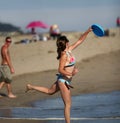 Girl playing frisbee Royalty Free Stock Photo