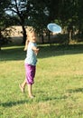 Girl playing frisbee Royalty Free Stock Photo