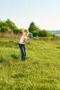 Girl playing frisbee in the park Royalty Free Stock Photo