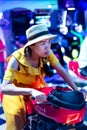 Girl playing games at arcade center