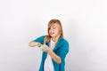 Girl playing with green slime looks like gunk Royalty Free Stock Photo