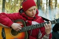 Girl playing guitar Royalty Free Stock Photo