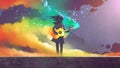 Girl playing the guitar with colorful smoke