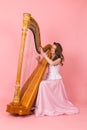 Girl playing the harp