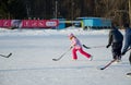 Girl playing hockey on ice