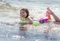 Girl playing on Lake Michigan beach Royalty Free Stock Photo