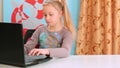 Girl playing on laptop