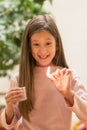 Girl playing with matches. Dangerous situation at home. A small child plays with matches, a fire, a fire flares up, danger, child Royalty Free Stock Photo