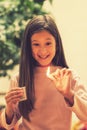 Girl playing with matches. Dangerous situation at home. A small child plays with matches, a fire, a fire flares up, danger, child Royalty Free Stock Photo