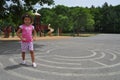 Girl playing on a maze