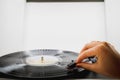 Girl playing music on vinyl turntables