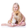 Girl playing with pets - dog and cat. Royalty Free Stock Photo
