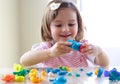 Girl playing with play dough