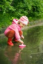 girl playing in the puddle