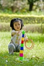 Girl playing quoits Royalty Free Stock Photo