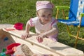 Girl playing in sandbox