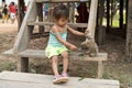 Girl playing with sloth Royalty Free Stock Photo