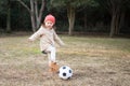 Girl playing with a soccer ball Royalty Free Stock Photo