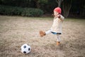 Girl playing with a soccer ball Royalty Free Stock Photo