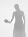 Girl playing table tennis, silhouette Royalty Free Stock Photo