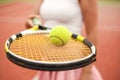 A girl playing tennis