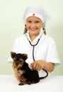 Girl playing veterinarian